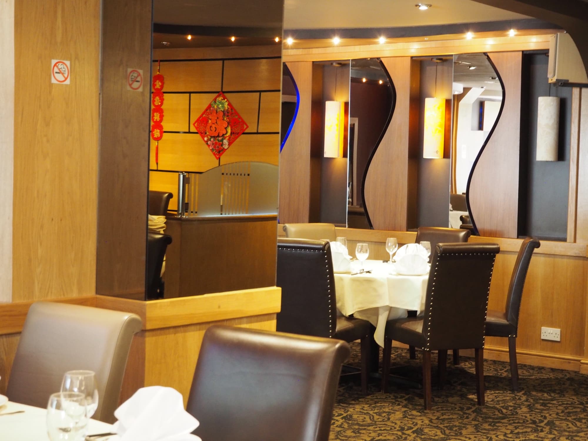 The main dining room laid for service